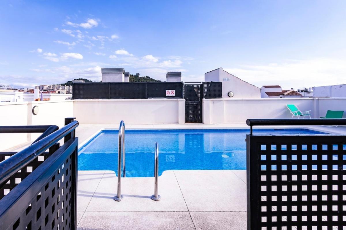 -Malagasunapts- Central Freeparking Rooftoppool Kültér fotó
